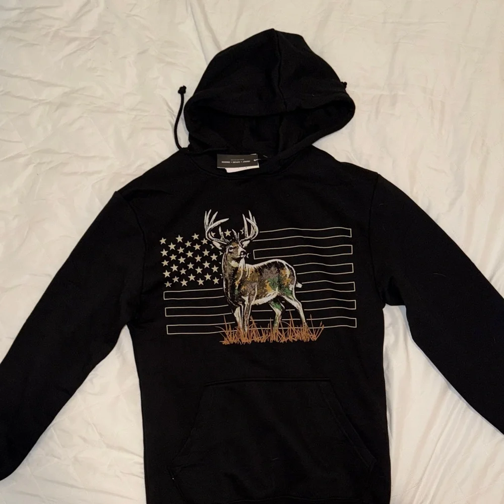 Black Hoodie with Deer and Flag Design - Picture 1 of 2